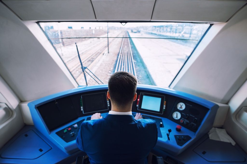 shot-train-cockpit-interior-with-driver-sitting-driving-train